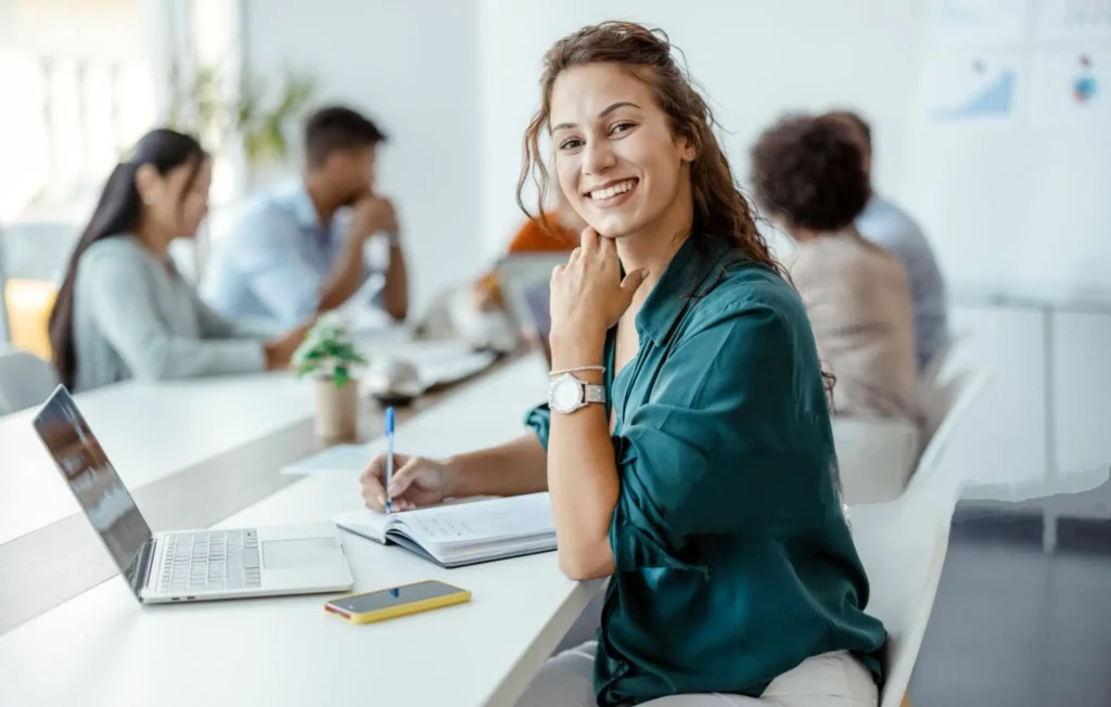 Young woman strategizing her wealth accumulation with a financial expert.